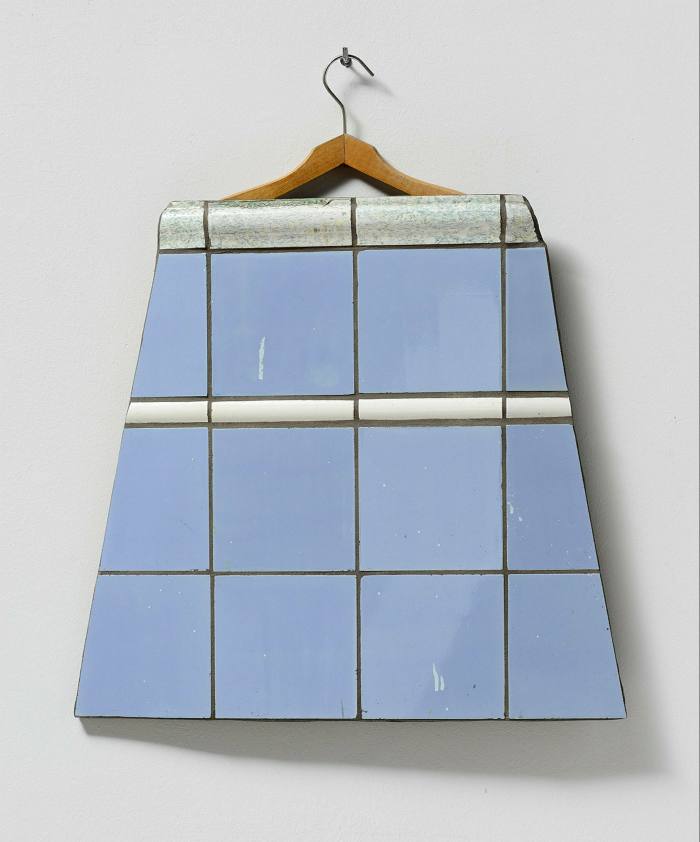 A flat skirt made of blue tiles