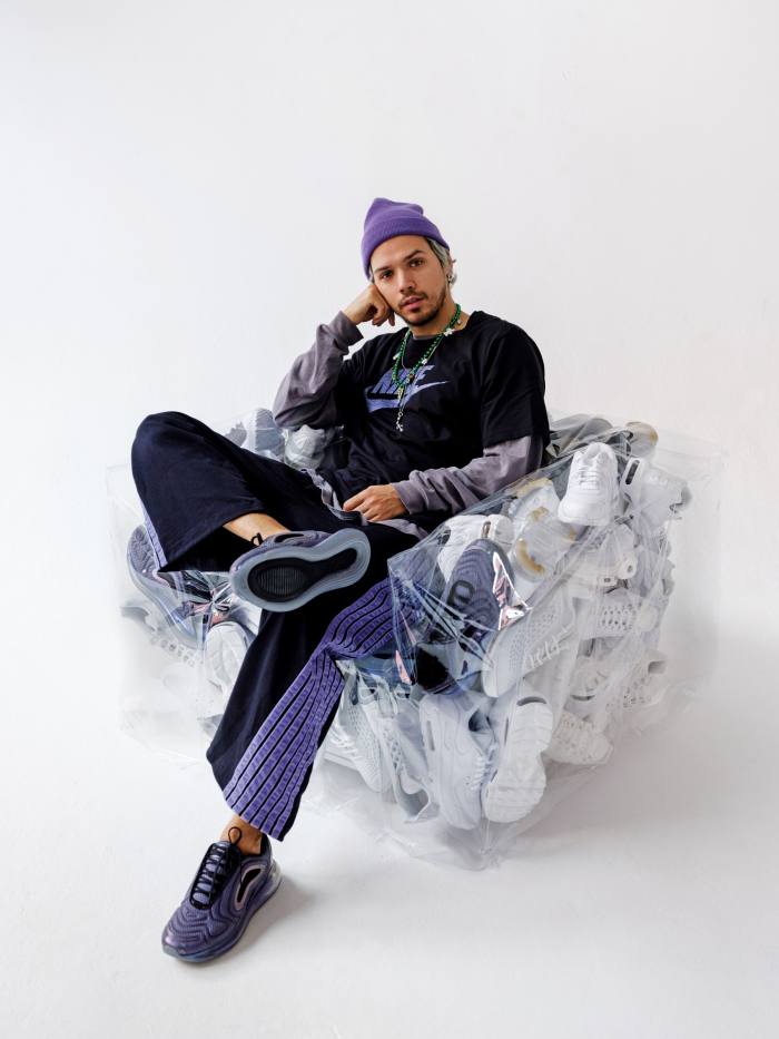 Crosby Studios founder Harry Nuriev and his 2019 Nike collaboration – a transparent armchair stuffed with Air Max sneakers