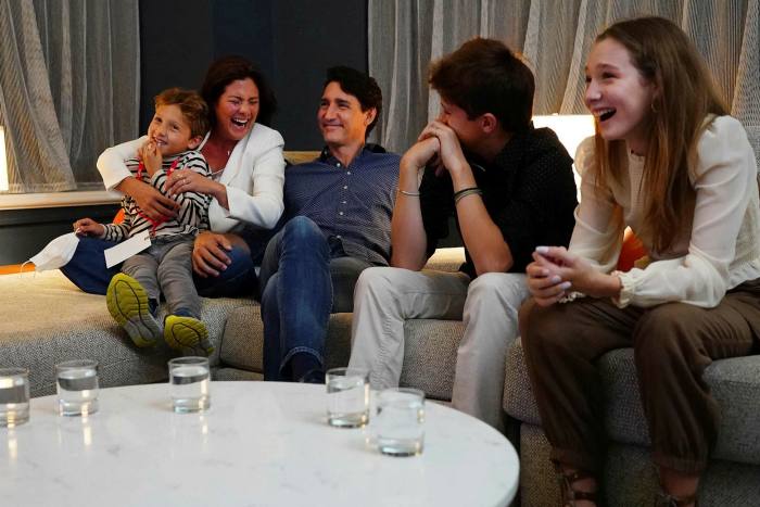 Canadian prime minister Justin Trudeau watches election results with his wife, Sophie Grégoire Trudeau, and children Xavier, Ella-Grace and Hadrien