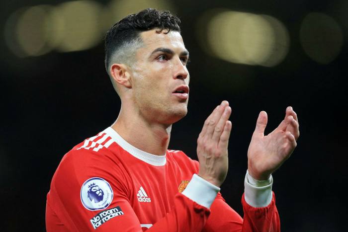Portuguese striker Cristiano Ronaldo applauds supporters after the English Premier League football match between Manchester United and Chelsea at Old Trafford