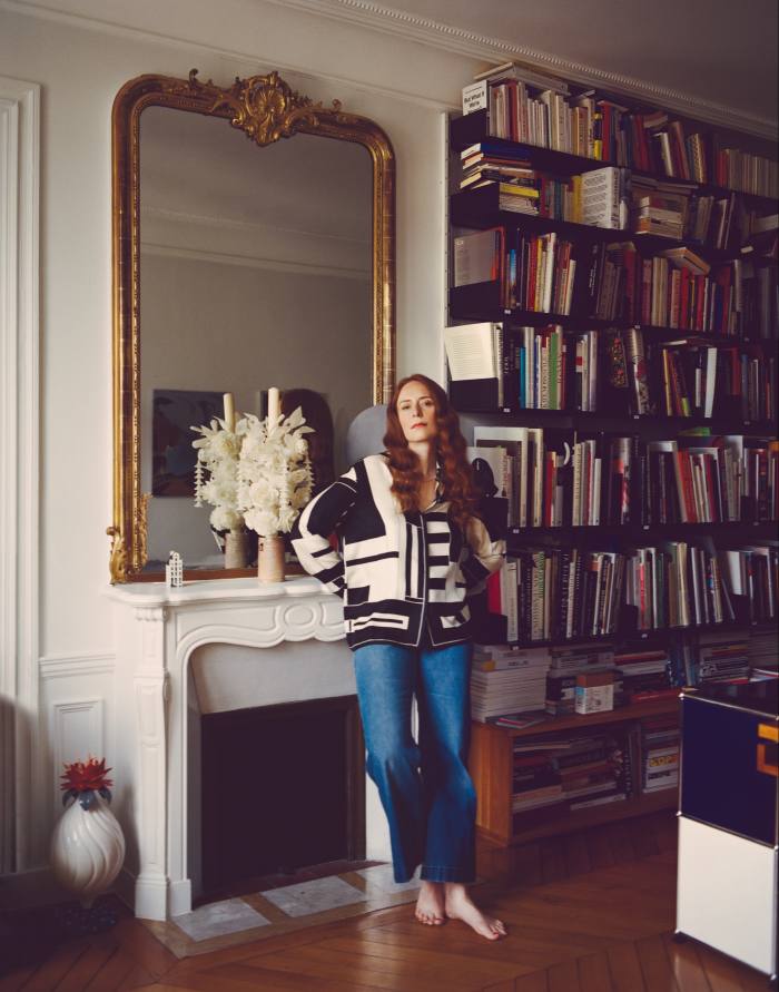 Vanhée-Cybulski by her bookshelves at home in Paris