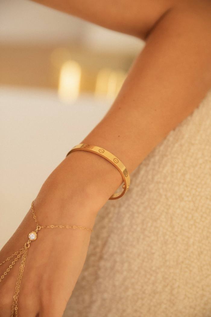 His girlfriend’s Cartier Love bracelet – a recent gift from Grolet