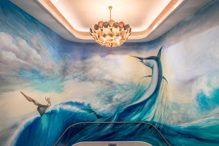 A large marlin greets the guests in the foyer