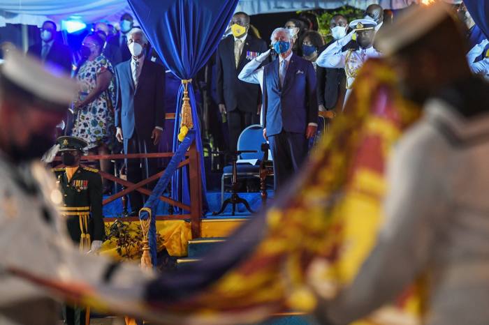 Prince Charles overseas the lowering of the Royal Standard   at the Presidential Inauguration Ceremony to mark the birth of a new republic in Barbados in November 2021