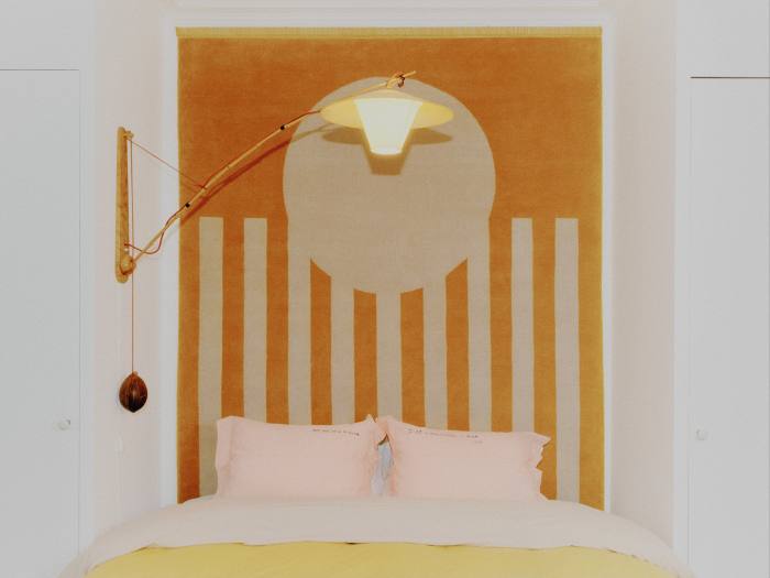 Pica’s bedroom, with its Sussy Cazalet wall hanging and Rupprecht Skrip lamp