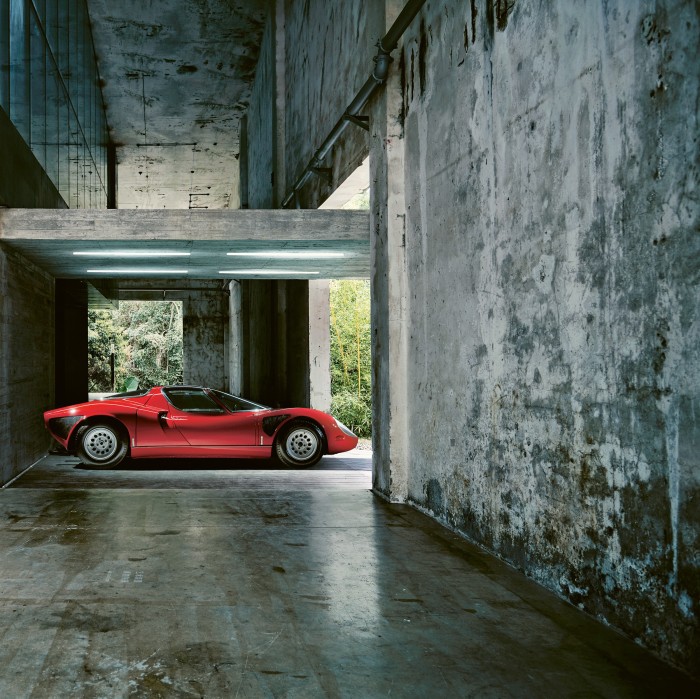 An Alfa Romeo Tipo 33 Stradale in a converted textile factory in Shenzhen by O-Office Arthitects, from the book Carchitecture by Thijs Demeulemeester, Thomas De Bruyne and Bert Voet, published by Lannoo Publishers at €39.99 (lannoopublishers.com)