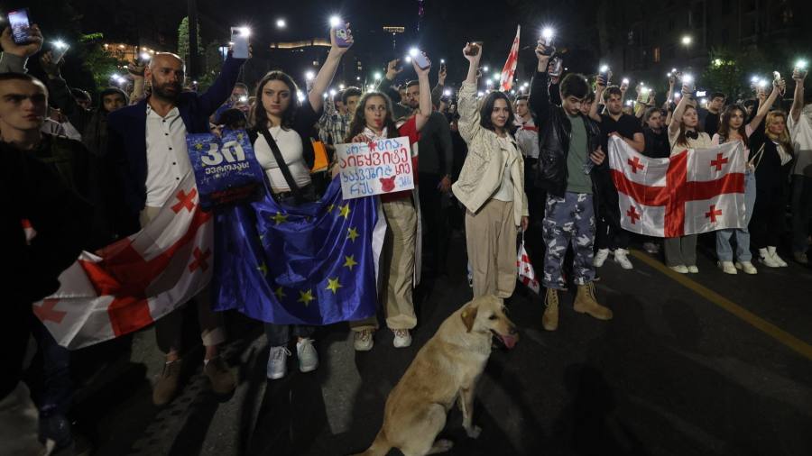 Georgians rally against ‘foreign influence’ law they say is modelled on Vladimir Putin’s regime