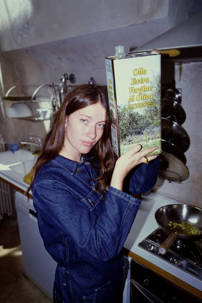 Photo of chef and model Alice Moireau in a kitchen 