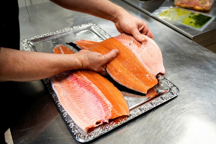A treat for locavores: the chef at restaurant Værk prepares Fredrikstad salmon raised less than 2km away