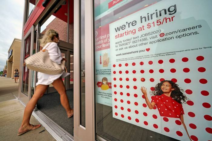 A help wanted sign is posted on the door of a Target store in Uniontown, Pennsylvania