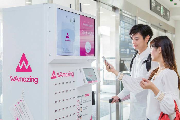A machine offers WAmazing free mobile phone Sim cards to travelers in Japan