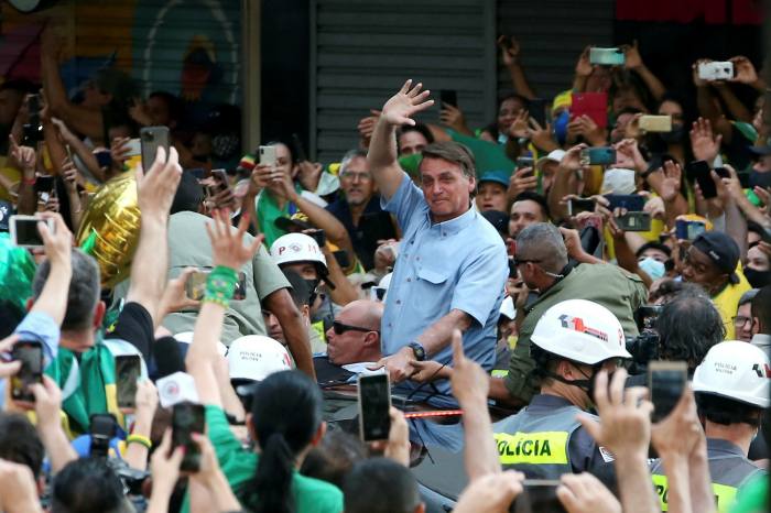 President Jair Bolsonaro waves to supporters during a demonstration on Brazil’s Independence Day in São Paulo on September 7