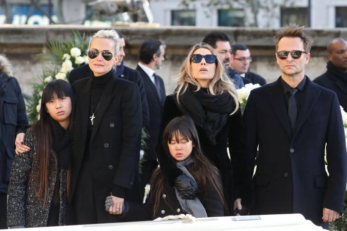 Des membres de la famille de Johnny Hallyday lors de ses funérailles à Paris