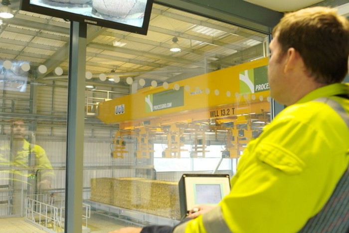 A worker in high-vis looks at the interior of Sleaford’s green energy plant  