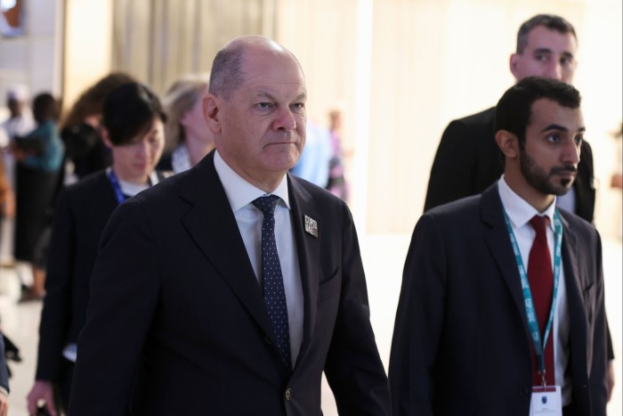 German chancellor Olaf Scholz arrives to deliver a speech at COP28