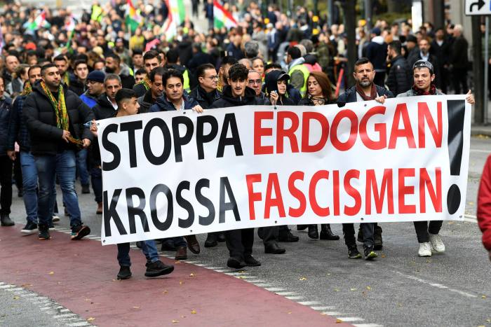 Kurdish protesters attend a demonstration against Turkey’s military action in north-eastern Syria, in Stockholm, Sweden, on October 12 2019