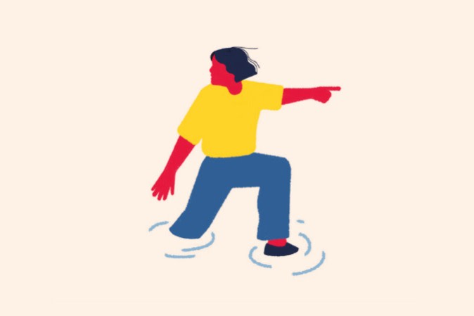 Illustration of a person standing in water and pointing 