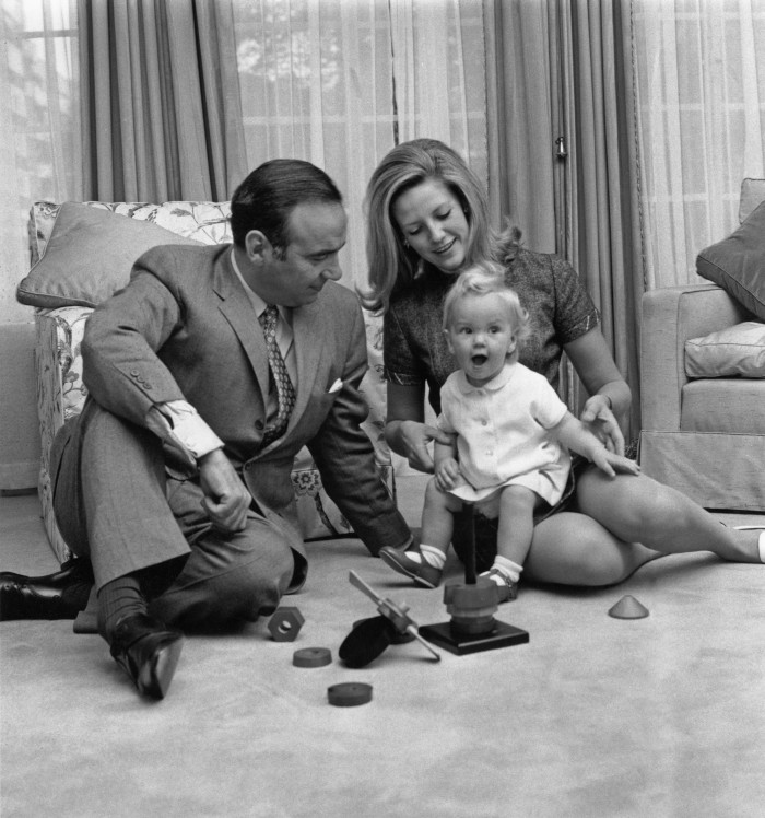 Rupert Murdoch with Anna Murdoch and 14-month old daughter Elisabeth at their home in London in 1969 