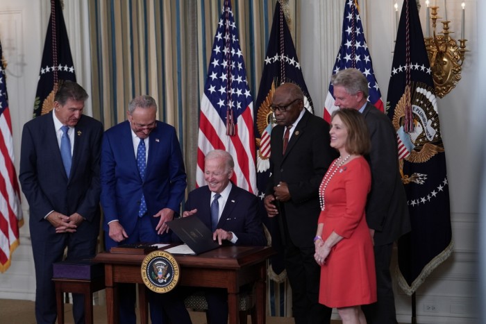 US president Joe Biden signs the Inflation Reduction Act in the White House in August