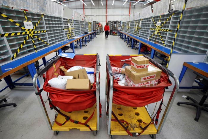 Parcels in trolleys at the Royal Mail sorting office in Chelmsford, UK, on Thursday May 13 2021