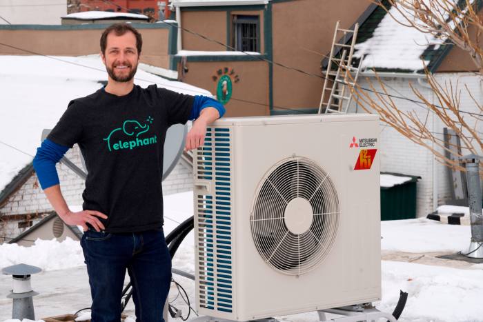 David Richardson, the co-founder of Elephant Energy, leans on a condenser in Denver, US