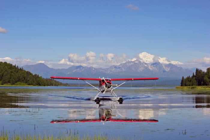 De Havilland Beaver lands on a lake in Alaska