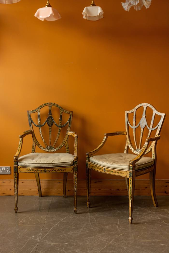 Retrouvius salvaged a set of six Hepplewhite- type chairs from a Mayfair jewellery store