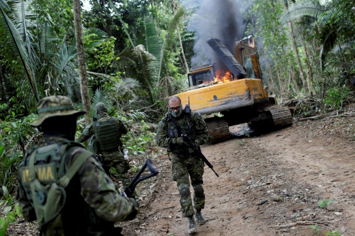 Machines are destroyed at an illegal cassiterite mine during by agents of the Brazilian Institute of the Environment and Renewable Natural Resources, or Ibama, in a national park near Novo Progresso, southeast of Para state