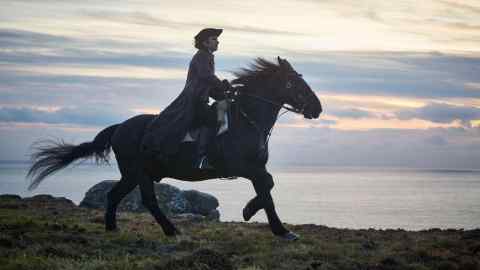 Ross Poldark — played by Aidan Turner in the  eponymous BBC series — galloping along the Cornish cliffs