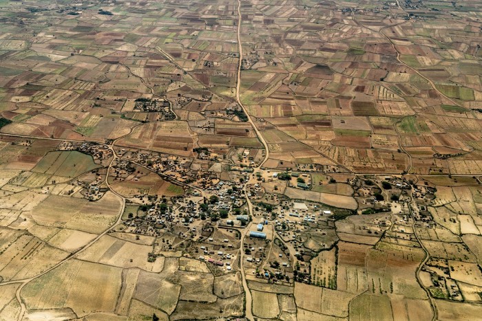 An aerial view of Ankilihago, showing arid fields and few trees