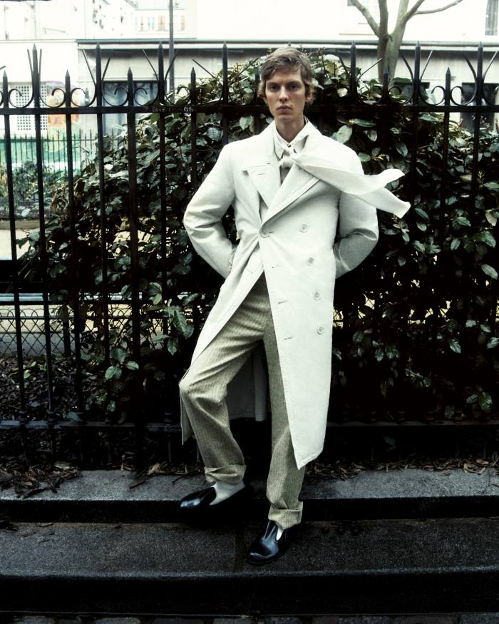 Leon wears Lemaire cotton ventile trench coat, £720. Bottega Veneta cotton twill string knotted shirt, £810, and cotton/polyamide trousers, £715. Rubber shoes, stylist’s own. Charvet silk chiffon scarf, £200. Kerstin Adolphson wool socks, POA