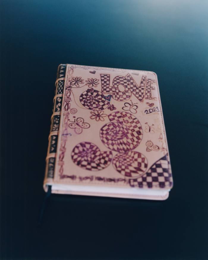 Her lyric notebook, in which she handwrites 'everything'
