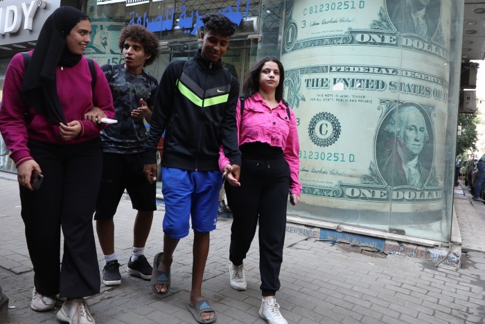 A currency exchange office with a large-scale image of the US dollar in Cairo, Egypt, 27 October