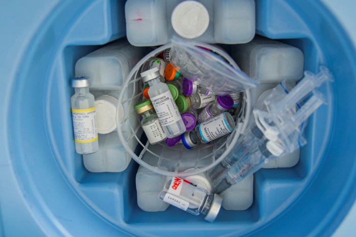 A coolbox with vials of flu, rubella and measles vaccines at  a vaccination day in Bogota, Colombia 