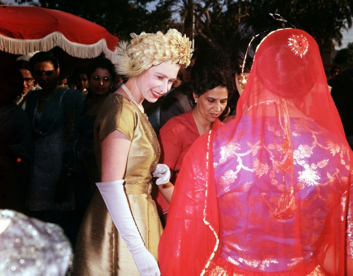 On a Royal Tour to Pakistan in 1961, Queen Elizabeth II is pictured at a costume parade in Karachi