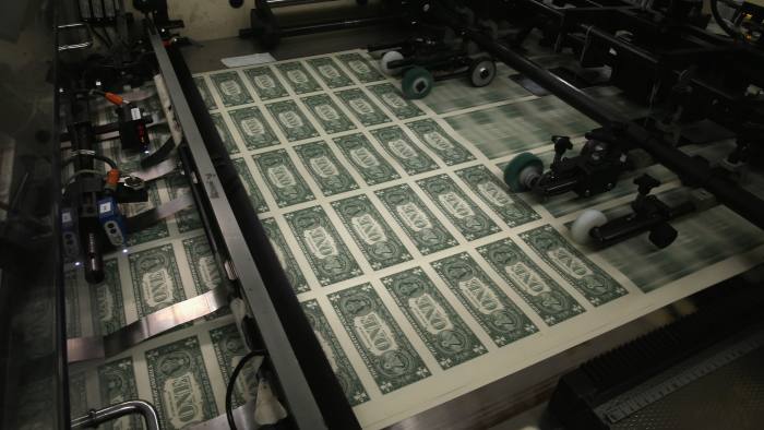 Sheets of one-dollar bills
