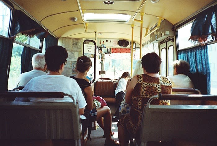 Passengers ride on the local bus from Soledar to Bakhmut, summer 2011