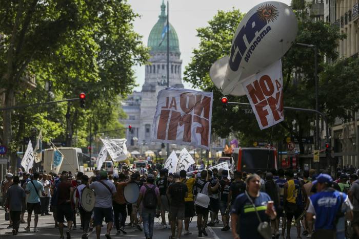 Labour unions and civil society groups protest against the IMF in Buenos Aires in October
