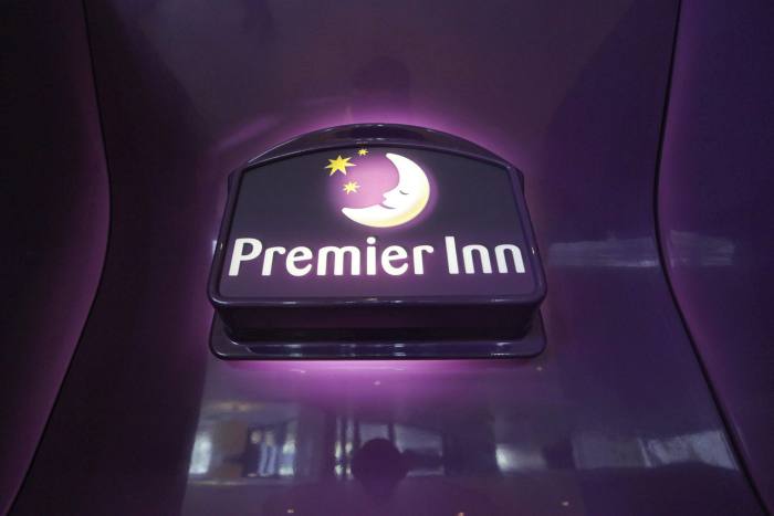 Premier Inn logo in reception area of one of their hotels