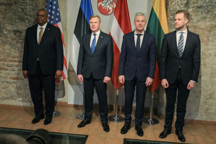 From left, US secretary of defence Lloyd Austin, Estonian defence minister Kalle Laanet Tsahkna, Latvian defence minister Artis Pabriks and his colleague Gabrielius Landsbergis, the minister of foreign affairs, meet in Vilnius on February 19