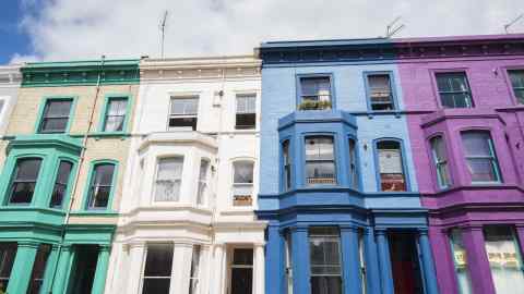 A row of multicoloured terraced houses in London’s Notting Hill