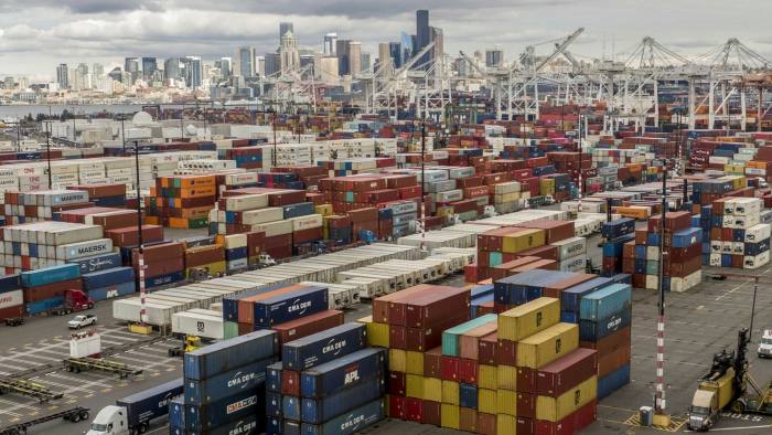 Shipping containers piled high in the Port of Seattle, Washington, United States