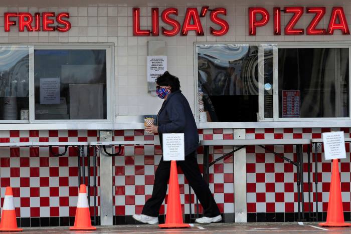 A pizza business in Maine. The state is one of several that has begun to relax restrictions even though the number of cases is still rising