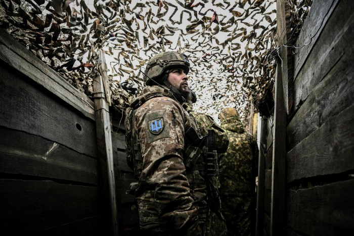 Ukrainian troops in a frontline trench in Novoluhanske