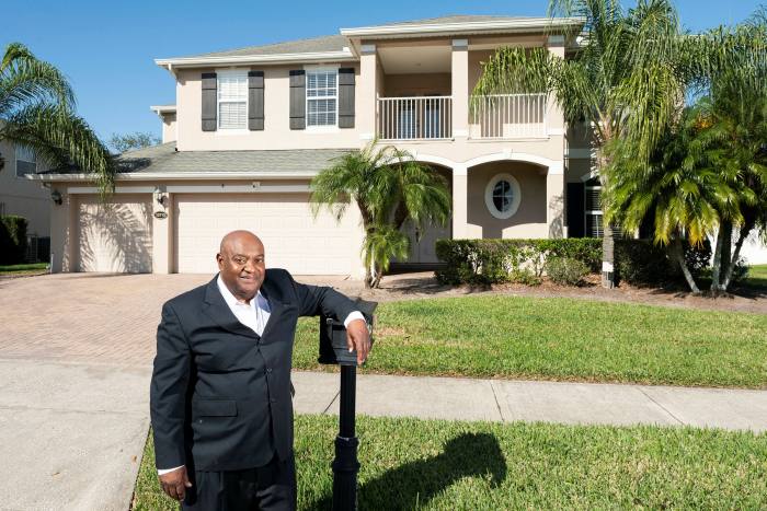 Frank Sledge outside the five-bedroom faux villa in the Florida city of Orlando that is part of rent-to-own landlord Home Partners’ portfolio 