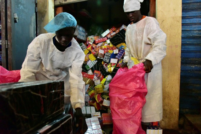 A shop selling fake medicines is raided by officials in Abidjan, Ivory Coast, in 2017