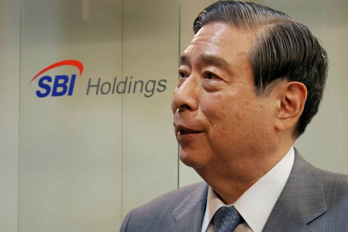 SBI Holdings chief executive Yoshitaka Kitao