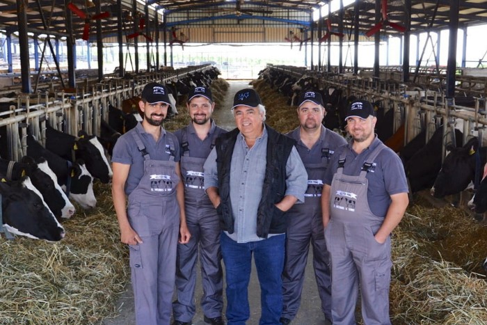 Takis Kazanas with his four sons on their farm in northern Greece. Regulators in Brussels are discussing rules that will lead to farms like his being treated as industrial plants, akin to steel mills or chemical works 