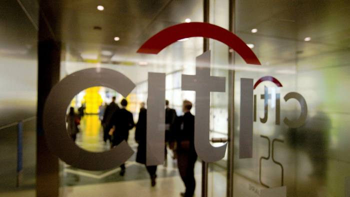 People entering Citi’s headquarters at Canary Wharf in London