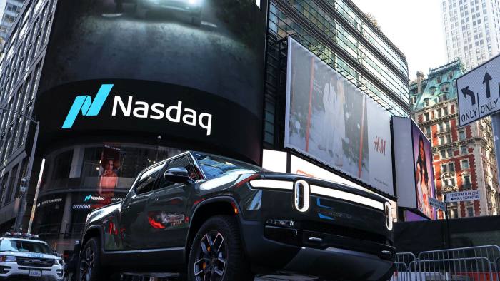 A Rivian electric vehicle near the Nasdaq building in Times Square, New York